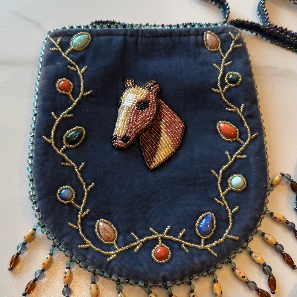 Velvet Horse pouch crossbody bag
Black, soft blue, olive green,  burgundy.